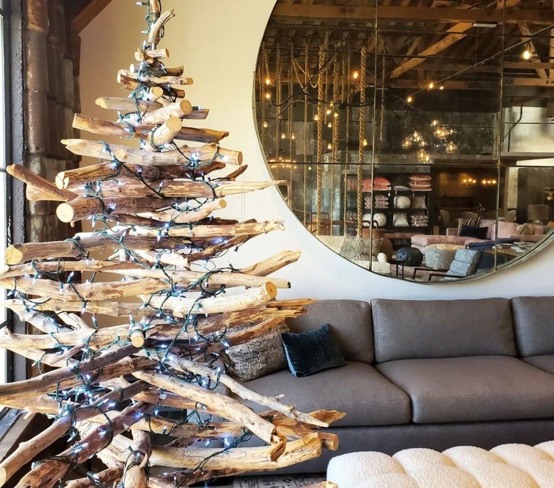 Living room with unique driftwood tree as centerpiece.