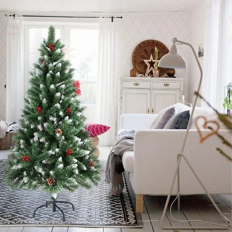 A festive Christmas tree adorned with ornaments and lights stands in a cozy living room.